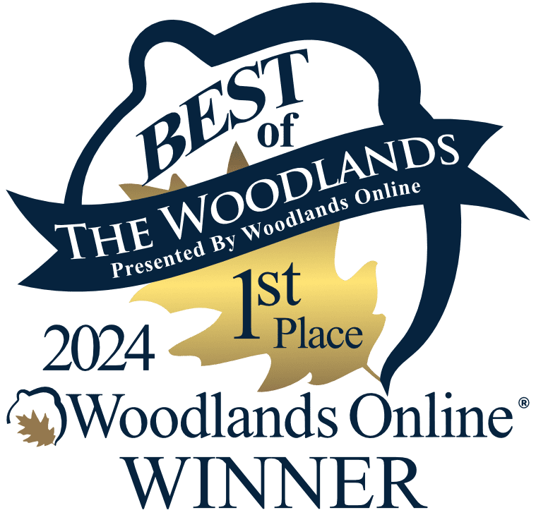 Header of "Best of The Woodlands 2024" featuring a 1st place award with a star emblem and text, presented by Woodlands Online.