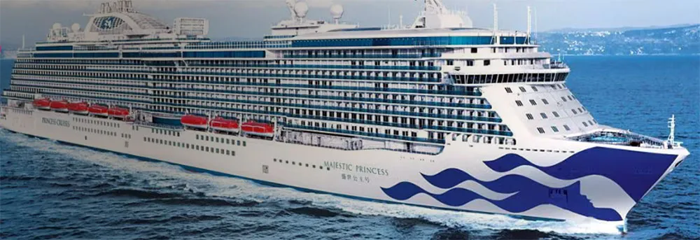 The Majestic Princess, featured on a Fox Travel British Isles cruise, sails gracefully on the ocean with a picturesque coastline in the background. The Majestic Princess, featured on a Fox Travel British Isles cruise, sails gracefully on the ocean with a picturesque coastline in the background.